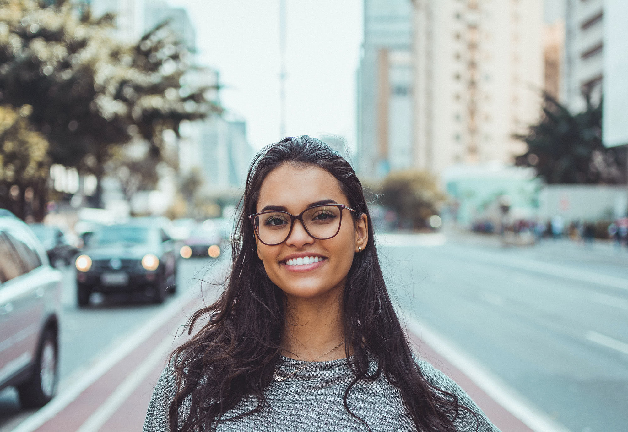 a woman looking at the camera after learning sober stategies