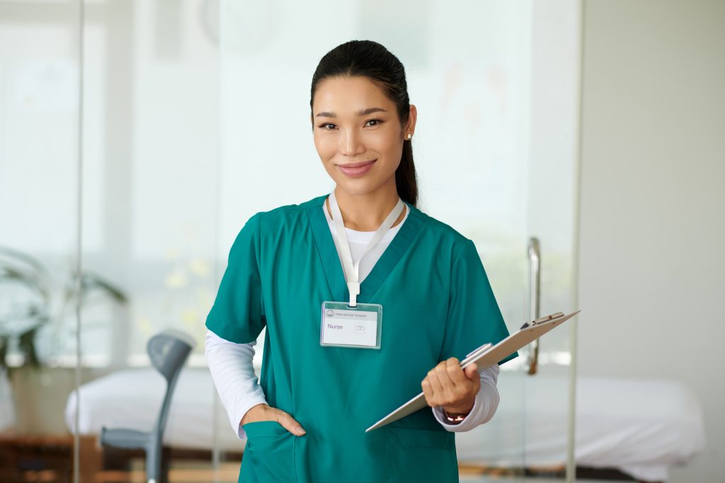 a smiling addiction nurse at a rehab center