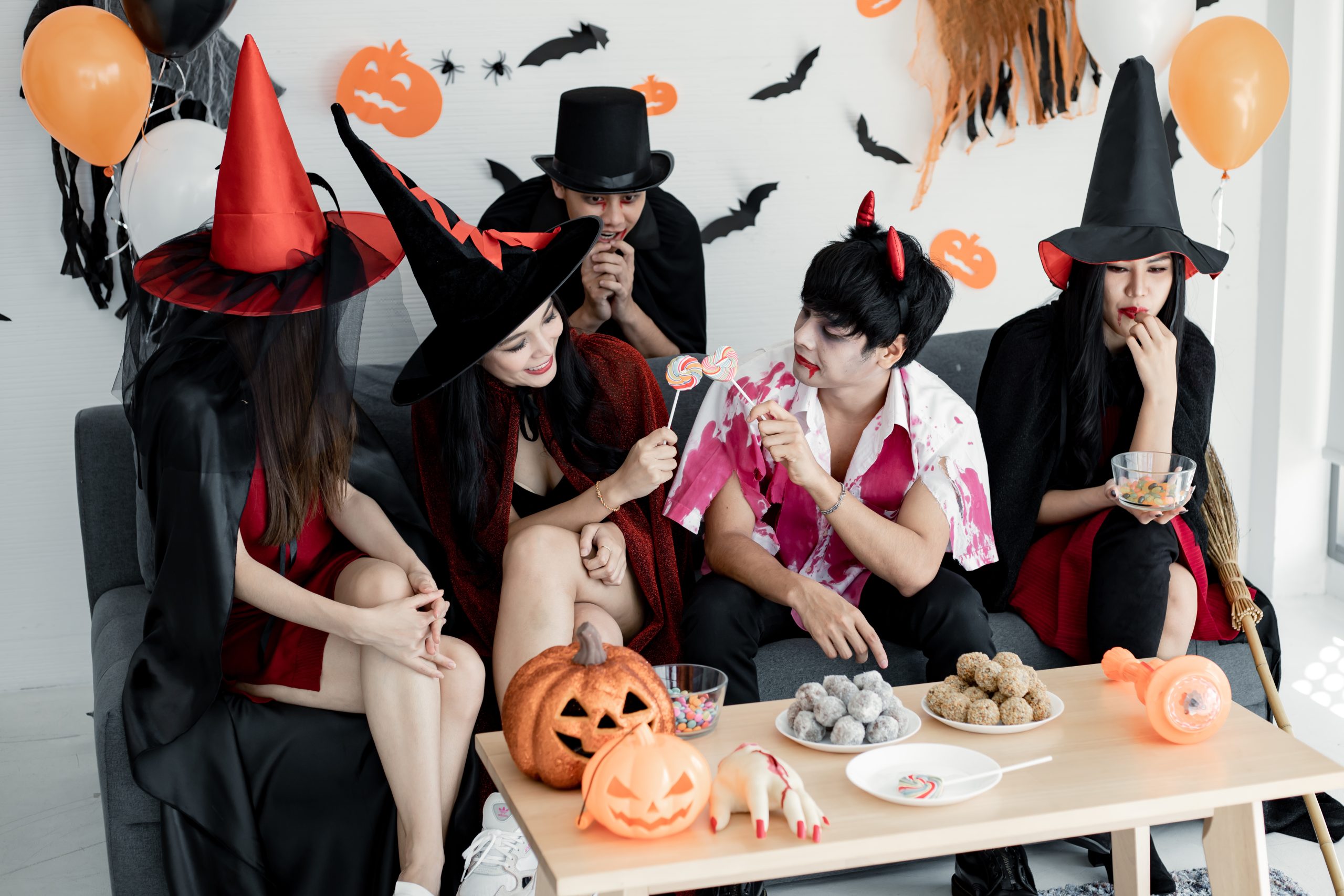 people at a sober Halloween party dressed up as witches